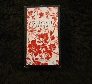 3.3 Oz.Gucci Bloom Fragrance with Red Floral Design Sprayed One Time Like New.